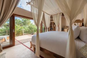 Postel nebo postele na pokoji v ubytování La Valise Tulum, member of Small Luxury Hotels + 37 fotografií