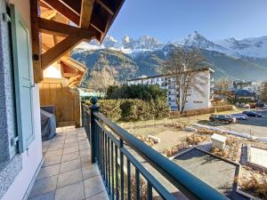a balcony with a view of the mountains at Bells Lodge in Chamonix-Mont-Blanc