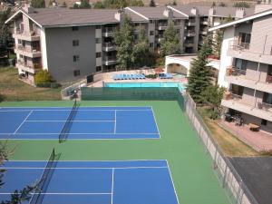 an aerial view of a tennis court in a city at Beaver Creek West Condos in Avon