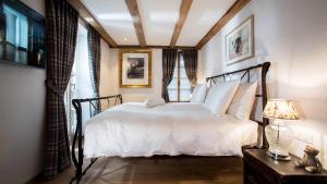 Postel nebo postele na pokoji v ubytování Hotel Olden