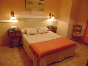 Postel nebo postele na pokoji v ubytování Hotel Sierra de Araceli Lucena