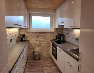 Kuchyň nebo kuchyňský kout v ubytování Alpen Appart Bludenz City