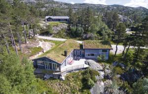 an aerial view of a house with a grass roof at Holiday Home Dølemo Hillestadheia Ii in Øvre Ramse