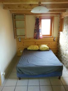Posteľ alebo postele v izbe v ubytovaní Chalet le Cordé: appartement