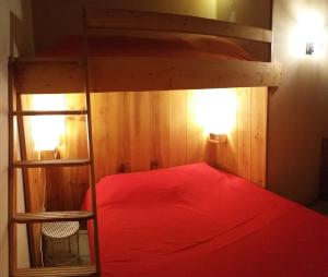 Posteľ alebo postele v izbe v ubytovaní Chalet le Cordé: appartement