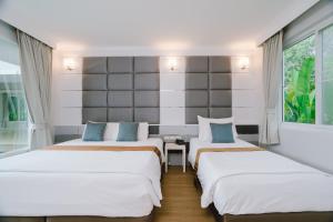 Postel nebo postele na pokoji v ubytování Bor Saen Pool Villa