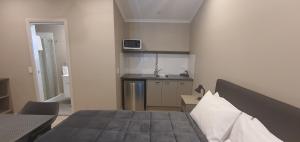 Voodi või voodid majutusasutuse Sunset Caravan Park Woolgoolga toas