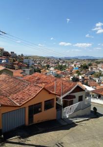 a view of a city from the roof of a building at Recanto Vovô João in Cunha
