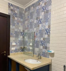 Ένα μπάνιο στο للإيجار الشهري بجاردينيا سيتي