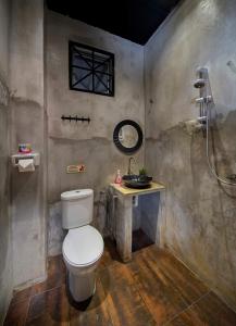 a bathroom with a toilet and a sink at ECO Haus Garden Residential in Johor Bahru