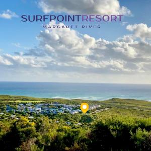a poster for a summer resort near the ocean at Surfpoint Resort in Margaret River Town