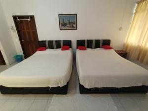 Postel nebo postele na pokoji v ubytování Mountain View Guest House KB