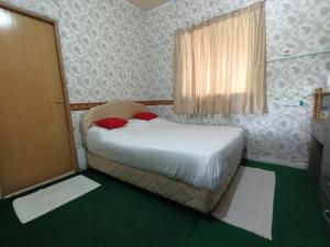 Postel nebo postele na pokoji v ubytování Mountain View Guest House KB