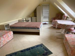 Postel nebo postele na pokoji v ubytování A- Villa (Vendégház) + 12 fotografií