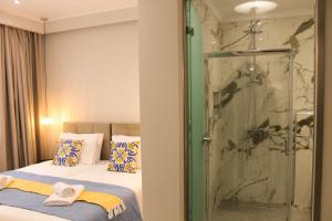 Posteľ alebo postele v izbe v ubytovaní Pelagia Apartment by Kormaris