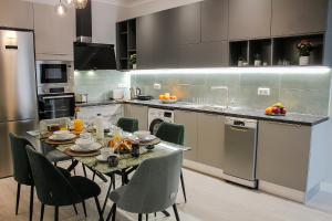 Kuchyňa alebo kuchynka v ubytovaní Pelagia Apartment by Kormaris