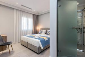 Posteľ alebo postele v izbe v ubytovaní Pelagia Apartment by Kormaris