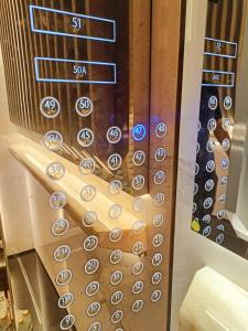 a close up of a vending machine with buttons at Platinum 2 KLCC NewLuxuryCondo By Langitel with InfinityCityView SwimmingPool in Kuala Lumpur