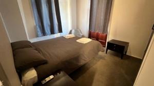 Katil atau katil-katil dalam bilik di Heritage Hotel Rockhampton