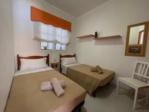 A bed or beds in a room at Apartamento Gustamar 25