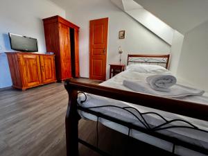 Postel nebo postele na pokoji v ubytování Hotel Modrava