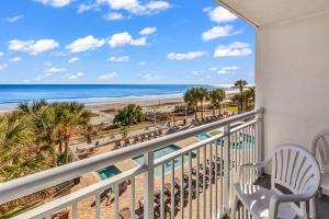 a balcony with a view of the beach at Oceanfront Condo in Atlantica Resort near Boardwalk in Myrtle Beach