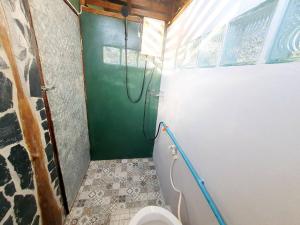 Vannituba majutusasutuses Baan Suan Taboon Homestay
