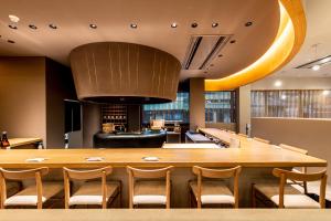 a large dining room with a large table and chairs at Yado Arashiyama -13 years old or older only- in Kyoto +49 photos