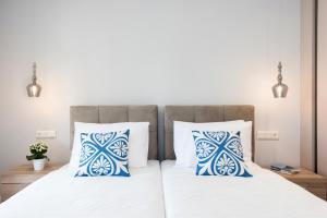 Posteľ alebo postele v izbe v ubytovaní Pelagia Apartment by Kormaris