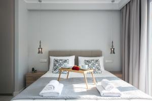 Posteľ alebo postele v izbe v ubytovaní Pelagia Apartment by Kormaris