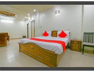 Cama o camas de una habitación en Hotel Kanha Classic, Kanpur