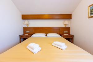 Posteľ alebo postele v izbe v ubytovaní Guest House Agava