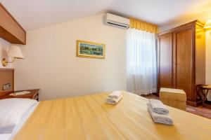Posteľ alebo postele v izbe v ubytovaní Guest House Agava