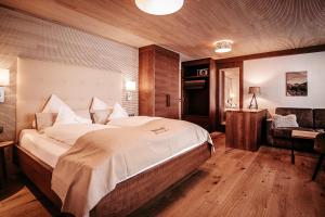 Postel nebo postele na pokoji v ubytování Hotel Birkenhöhe