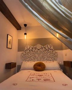 Katil atau katil-katil dalam bilik di La Barchetta di Carta loft a Soriano nel Cimino