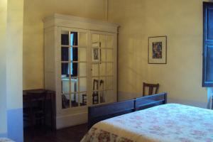 Posteľ alebo postele v izbe v ubytovaní Locanda Dei Baroni - Antica Dimora