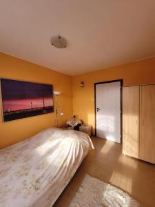 Łóżko lub łóżka w pokoju w obiekcie Apartament Rita