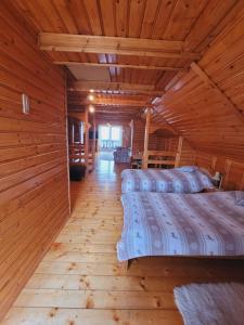 Łóżko lub łóżka w pokoju w obiekcie Apartament Rita