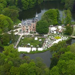 an aerial view of a large building with a park at Modern Spanish Hacienda - 10km from the coast in Ichtegem