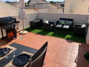 Posedenie v ubytovaní 4+2 beds apartment in VillaMartin, Torrevieja