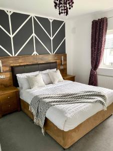 Posteľ alebo postele v izbe v ubytovaní Loughrea Holiday Home
