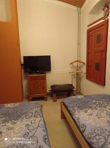 Postel nebo postele na pokoji v ubytování Atlantis Apartmán 1