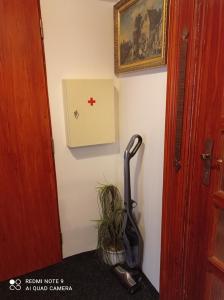 a vacuum cleaner in a corner of a room at Atlantis Apartmán 2 in Klášterec nad Ohří