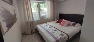 Posteľ alebo postele v izbe v ubytovaní Apartament przy lesie