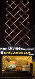 a sign for a hotel driving rennaissanceermottermott at HOTEL DIVINE RAMESHWARAM in Rāmeswaram