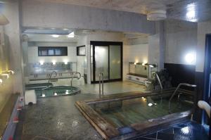 The swimming pool at or close to Suminoyu Hotel
