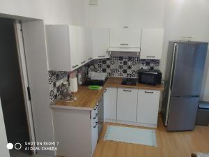 Kuchyňa alebo kuchynka v ubytovaní Apartament przy Słonecznej