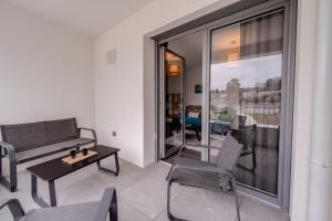 Posedenie v ubytovaní Le 305 - T3 with garage and beautiful terrace
