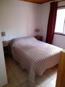 A bed or beds in a room at los chañares de San Javier