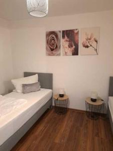 Postel nebo postele na pokoji v ubytování Aulbach' s Appartments